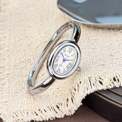 Novo estilo pulseira de banheira pequeno mostrador requintado e exclusivo luz luxo feminino high-end algarismos romanos relógio de quartzo oval